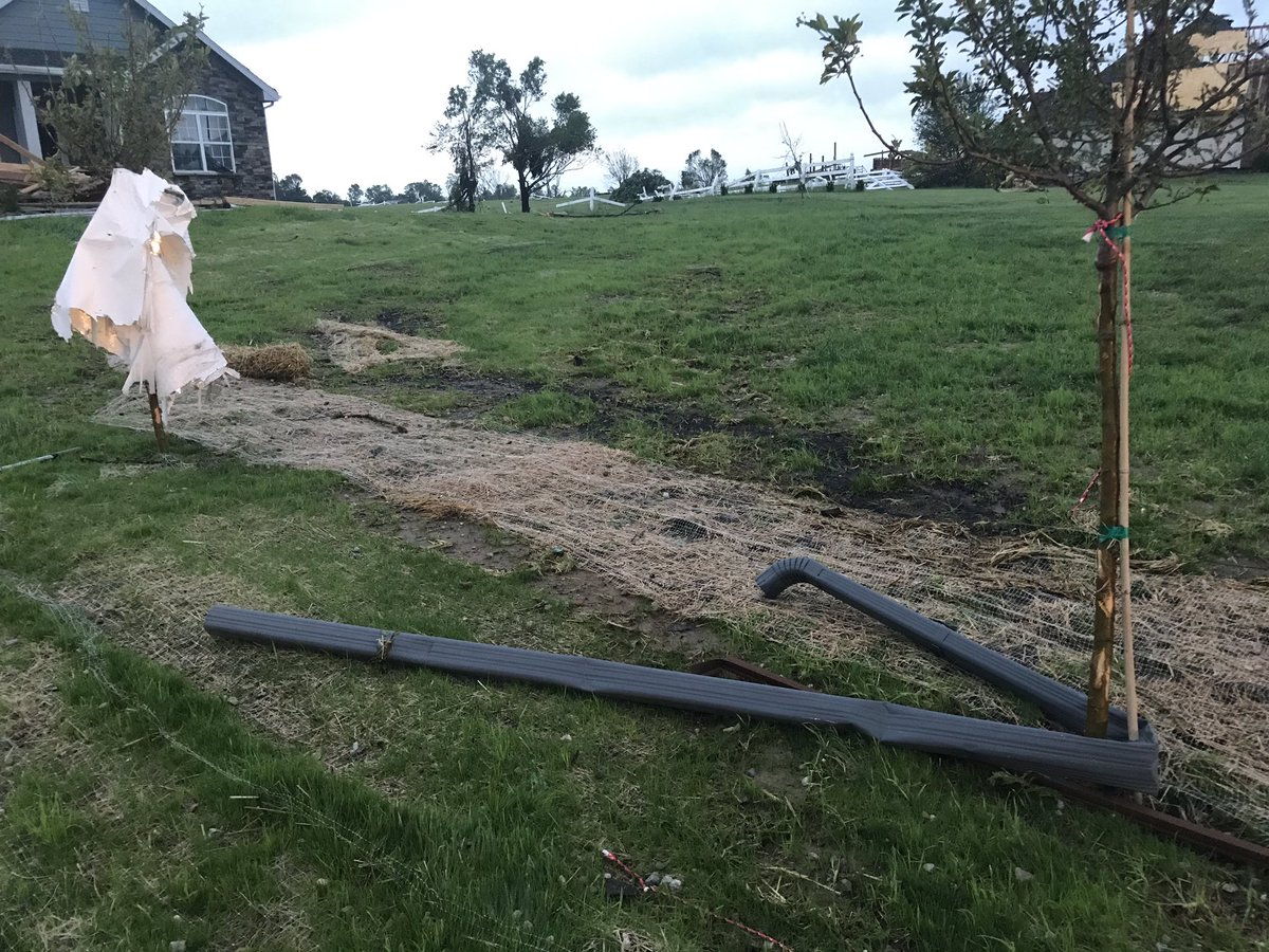 From one house to the next, the tornado damage in Linwood Kansas is incredible. Sheds wiped out, roofs missing, gutters wrapped around trees
