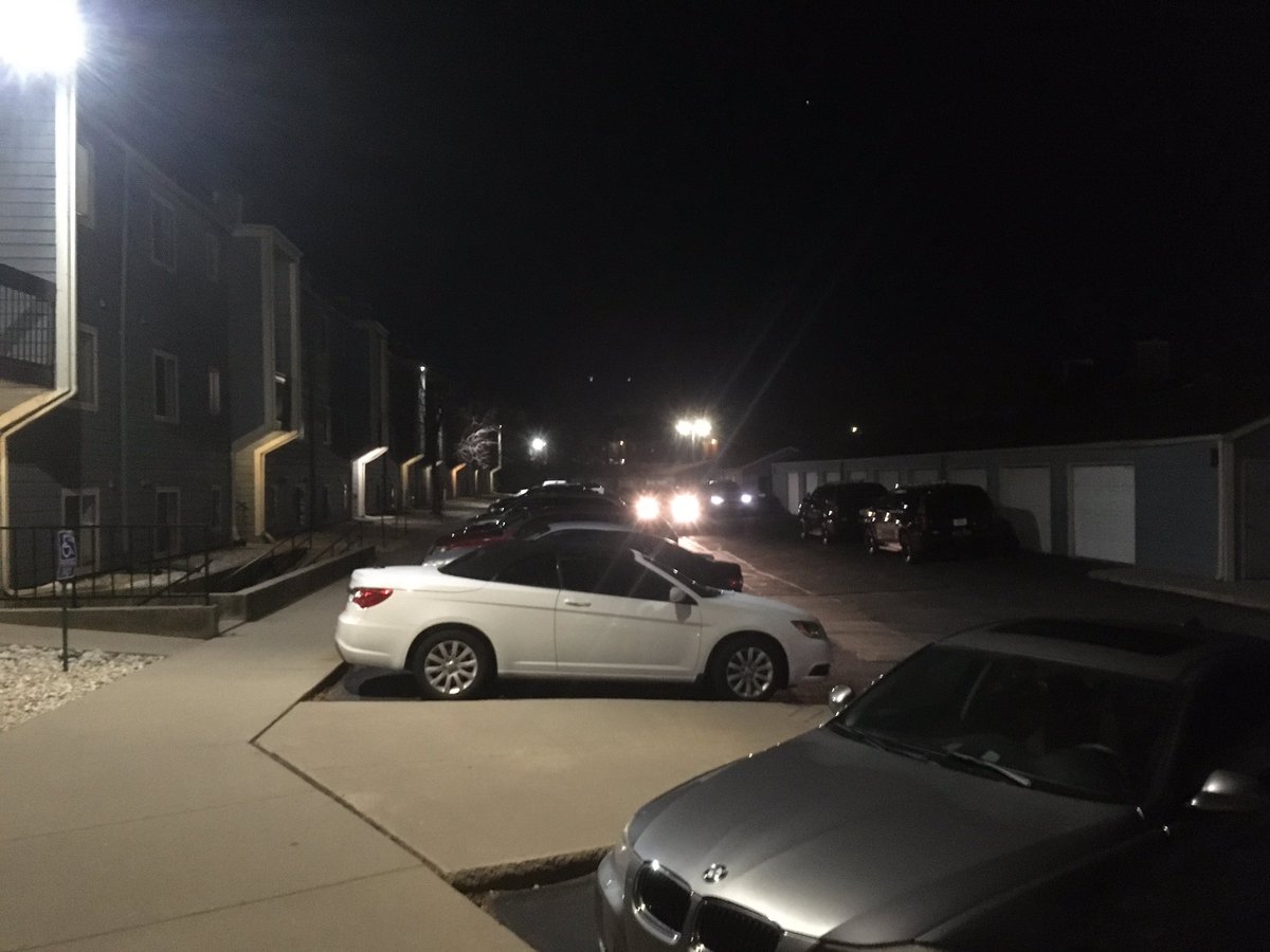 At a reported shooting at an apartment complex off S Topeka. Multiple police vehicles on scene, where reportedly two people were shot.