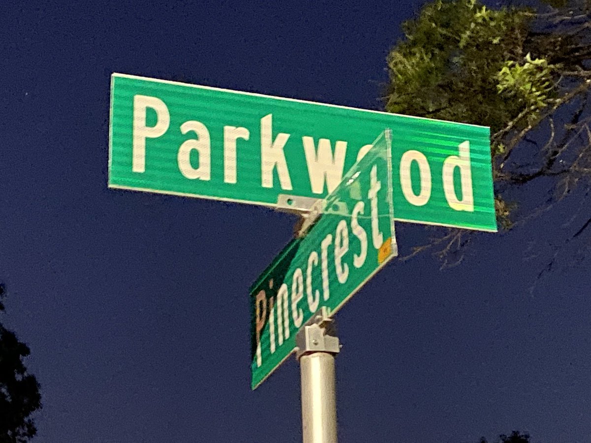 Police have put crime scene tape & set up a partition in front of the home where the shooting took place.   man is killed in a shooting near Parkwood & 13th, between Woodlawn & Oliver in Wichita.