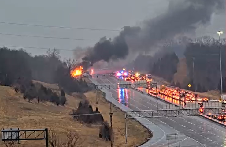 Massive fire from vehicle crash shuts down all of I-70 at I-435 in KCK. Major traffic backup. Emergency crews on the scene