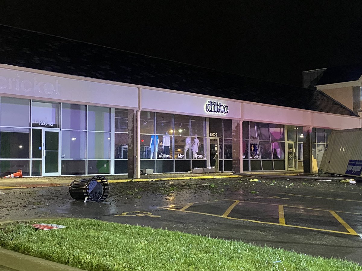 Got some damage near the shopping complex in front of Sam's Club in Lenexa. FD is here checking on gas lines. There is some window damage to one of the stores. The storm moved the shipping container & took down a light pole