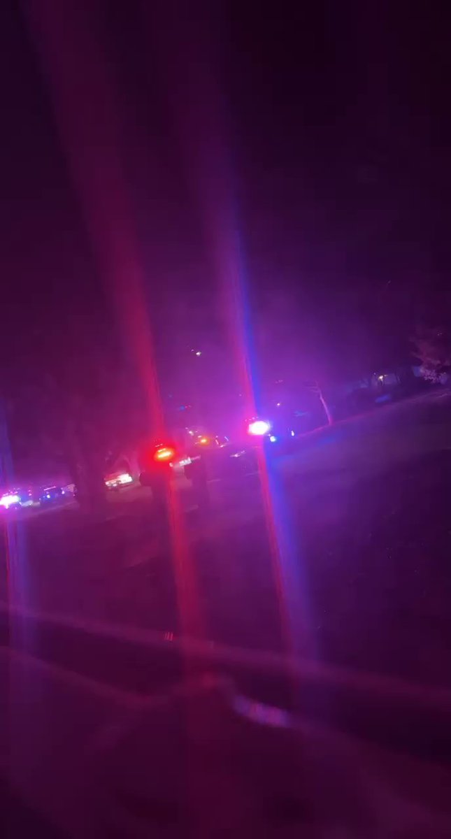 Police Chase   4 males in a black car, SHOOT AT OFFICERS & toss their gun(s)  They drove to a house in the area of S Vassar and  E Zimmerly and  bailed on foot. Police have set up a perimeter in that area in order to try  catch them